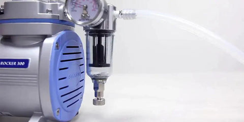 Oilless Vacuum Pump For Lab Filtration With 99 mbar Vacuum, 23 Lpm Airflow, 1750 RPM, showing gauge and tubing attachment