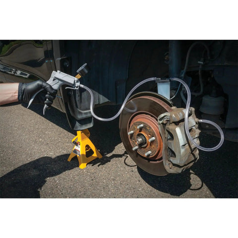 One Man Hand Vacuum Pump Kit For Brake Bleeding And Automotive Tests showing brake bleeding process on vehicle setup