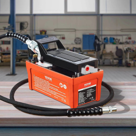 Air Hydraulic Pump, 10,000 PSI 1/2 Gal Reservoir, NPT 3/8" Oil Outlet, NPT 1/4" Inlet, 6.6 ft Pipe, in workshop, orange.