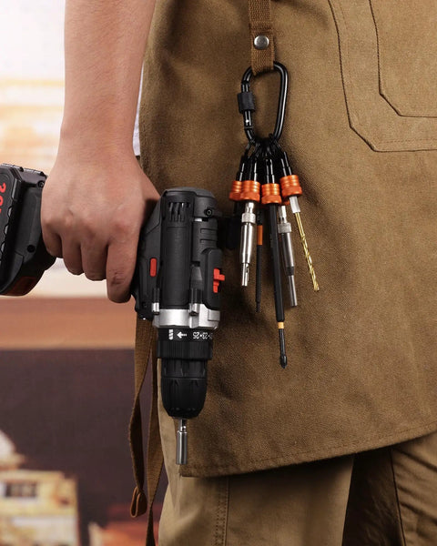 Close-up of Orange Aluminum Bit Holder Key Chain Set With Twelve Pieces One Fourth Inch Hex Shank Bit Holders attached to a belt.