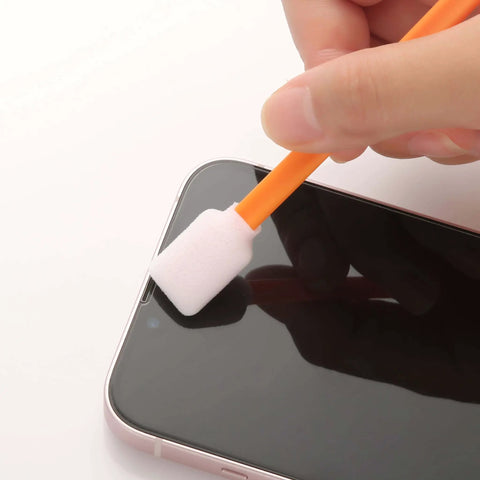 Large Rectangular Foam Cleaning Swab Sticks 5.25 Inch Orange Pack of 200 for Inkjet Printer Heads being used on a smartphone screen.