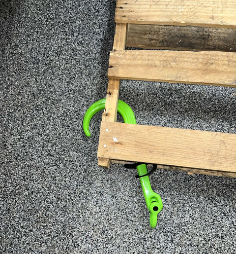 Workhorse Heavy Duty Pallet Puller Quick Rig Hook And Shackle 2 Ton 4000 Lbs WLL Forged Steel Pallet Mover Grabber shown under pallet.