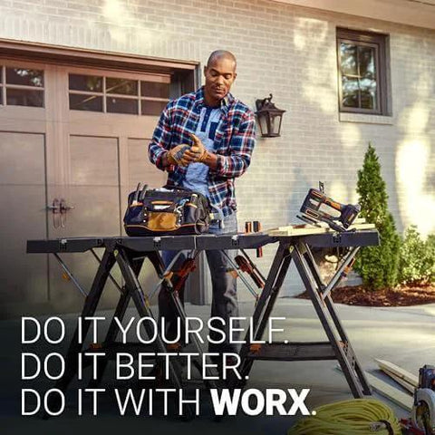 Man using Pegasus 2 In 1 Folding Work Table And Sawhorse Portable Workbench With Clamps WX051 outdoors, house background