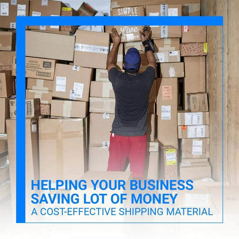 Warehouse worker organizing stacked shipping boxes
