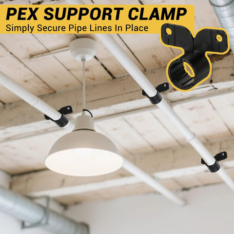 Pex pipe support clamps, nylon R-type, on white PEX pipes along a wooden ceiling with a pendant light