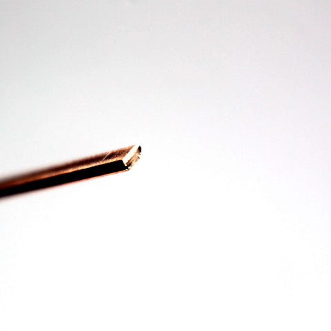 Close-up of phosphor copper brazing rod tip from Phosphor Copper Brazing Rod Kit Nitrate Sticks 20 Pieces Pro Grade for HVAC Refrigeration Copper Solder Alloys Welding Rods for Air Conditioners Refrigerators Plumbing Pipes Gas and Freezers with Sealed Tube Storage