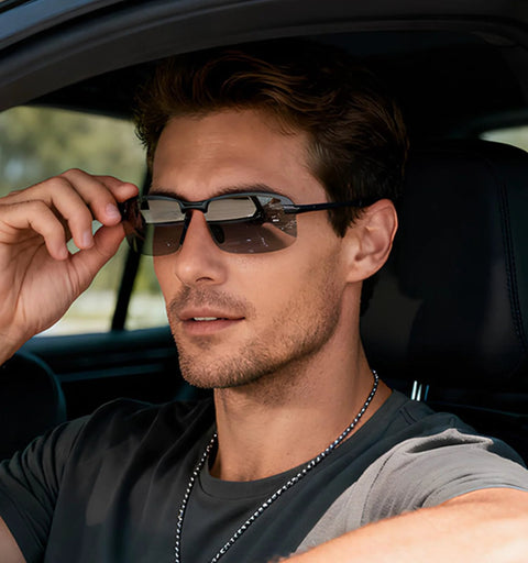 Man adjusting Photochromic Polarized Driving Sunglasses for Men Day and Night Vision while sitting in a car