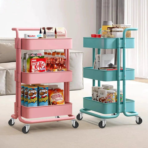 Two rolling carts with snacks and books displayed on three shelves, featuring 360-degree swivel wheels on a carpeted floor.