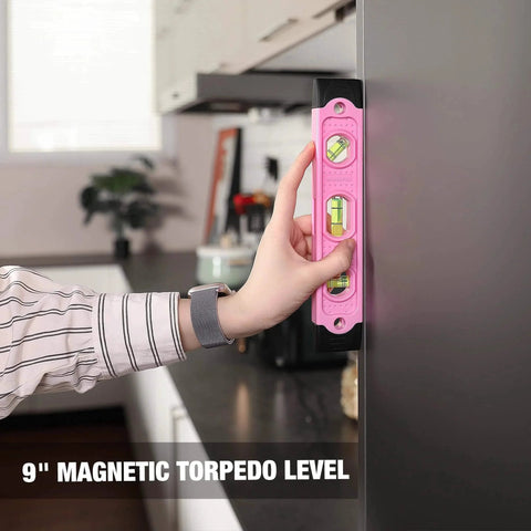 Using the pink 9-inch magnetic torpedo level from Pink 263-Piece Home Repair Tool Kit With Wide Mouth Storage Bag For DIY Projects