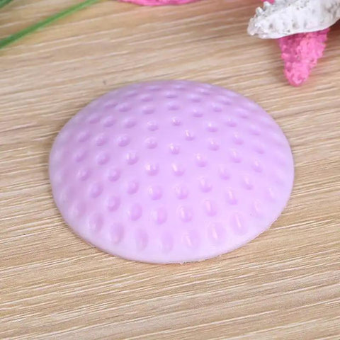 Pink silicone wall protector for door handles, part of the 5 Piece Silicone Self Adhesive Wall Protectors For Door Handles And Doorknobs Pink Cushioning Bumpers Buffer Guards And Silencers To Prevent Scratches Noise And Crashes In Home And Office set, shown on a wooden surface