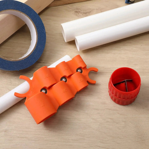 Six In One Depth Gauge And Pipe Deburring Tool Kit with orange gauge and red deburring tool on wooden surface