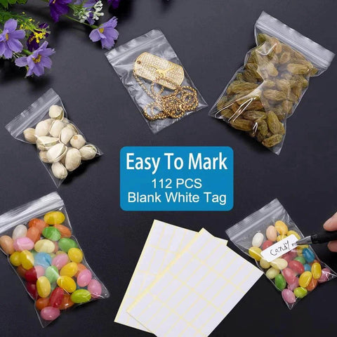 Assorted items in resealable clear poly bags from 300 PCS Small Plastic Bags Set In 3 Sizes 2x2.5in, 2.2x3in, 3x3.5in for beads jewelry pills