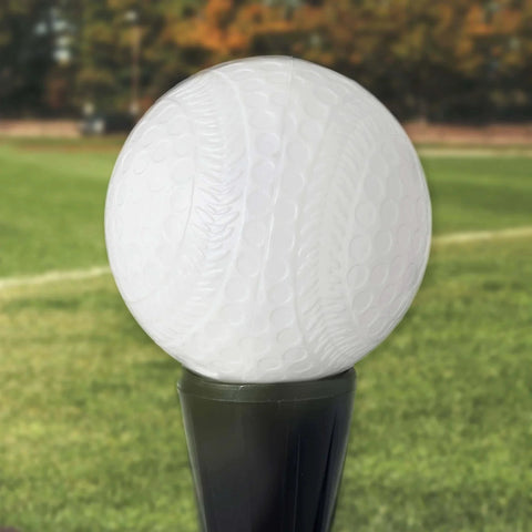 MLB Plastic Baseballs - 8 Pack shown on a stand in a grassy field, highlighting perforated design for safe training.