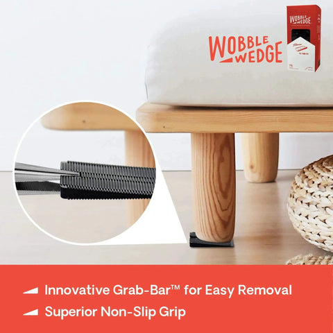 Flexible Plastic Leveling Shims Set 75 Pack supporting a wooden bed leg, highlighting non-slip grip feature, for home improvement.