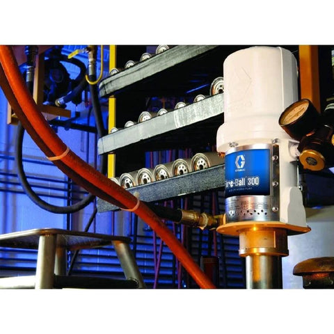 Pneumatic Drum Pump, 3/8 NPT, 140 psi installed in an industrial setting with connected hoses and pressure gauge.