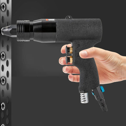 Industrial Grade Pneumatic Rivet Nut Gun Kit With Heads For 10-24 1/4 5/16 And 3/8 Inch Sizes Quick Change Nosepiece 20 Mandrels Included Air Rivnut Pull Setter For Auto Body Metal Fabrication And Heavy Duty DIY Projects being used on metal surface