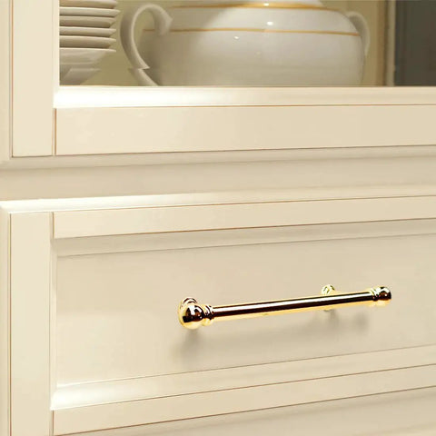 10 Pack Polished Brass Cabinet Pulls 5 Inch Hole Center 128mm Solid Zinc Alloy Handles installed on white kitchen drawer