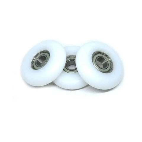 Three POM-coated bearing wheels sized 8x38x10mm for rowing machines and compact equipment ensuring smooth, quiet operation.