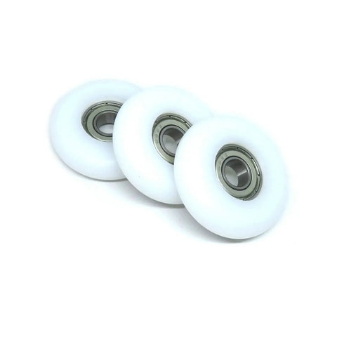 Four POM-coated bearing wheels sized 8x38x10mm deliver quiet, smooth operation for rowing machines and compact equipment, side view