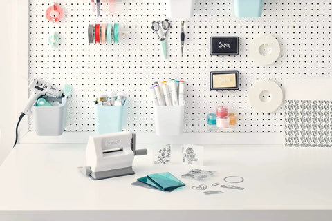 Portable Die Cutting And Embossing Starter Kit For Arts And Crafts Scrapbooking And Cardmaking On The Go Sizzix Sidekick 661770 on desk