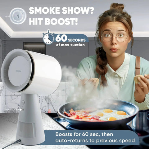 Portable countertop range hood with 5-layer filtration setup beside a frying pan, showing smoke extraction in use.