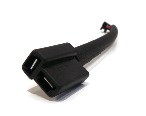 Close-up of electric PTO clutch cable for Exmark 104-3334, showing double connector and braided wire.