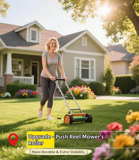 Person using push reel mower on lawn with house and flowers in the background.