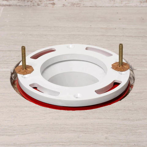 Closet Flange Spacer Half Inch Thick PVC White Stackable Flange Height Booster with Metal Ring installed on floor