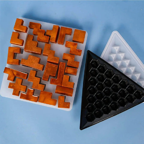 Pyramid Resin Puzzle Molds 2 Pack Silicone Mold For Epoxy Resin Casting And DIY Crafts shown with resin pieces on blue background