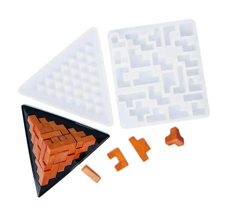 Pyramid Resin Puzzle Molds 2 Pack Silicone Mold For Epoxy Resin Casting And DIY Crafts with orange puzzle pieces displayed beside molds