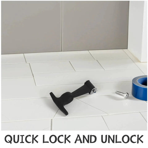 Black T-handle draw latch with mounting screw, angled view on white tile floor