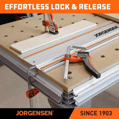 Six And Five Eighths Inch Ratcheting Table Clamp With Quick Release For Track Saw And MFT Guide Rails in use on workbench