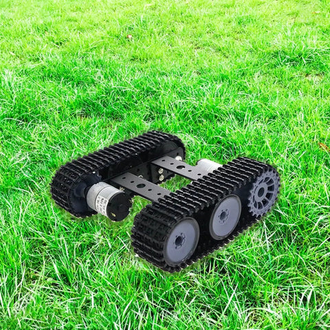 Remote Control RC Robot Tank Car Chassis with DC Motor Kit on grass, durable metal body, adjustable track length for Raspberry Pi and Arduino.