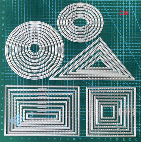 8 Piece Rectangle Cutting Die Set For Scrapbooking And Card Making Includes Eight Size Options 12x8cm to 5x1cm on a grid mat