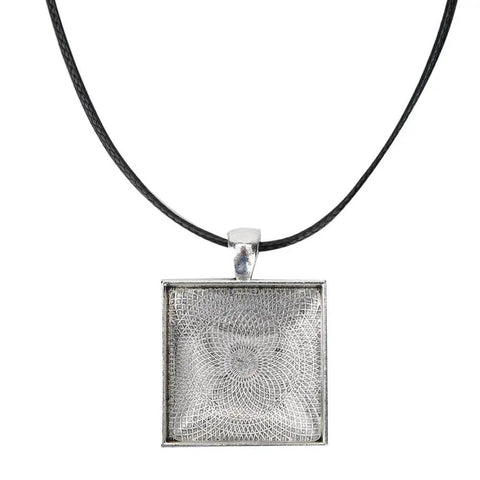 Square pendant on black cord from DIY Necklace Making Kit With Base Tray Pendant Molds And 60pc Metal And Plastic Accessories for crafting.