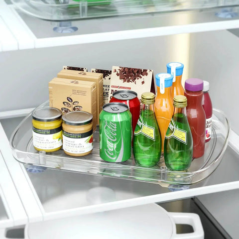 Clear Rectangular Refrigerator Lazy Susan Organizer With 360 Degree Rotation And Pullout Design holding bottles and cans.