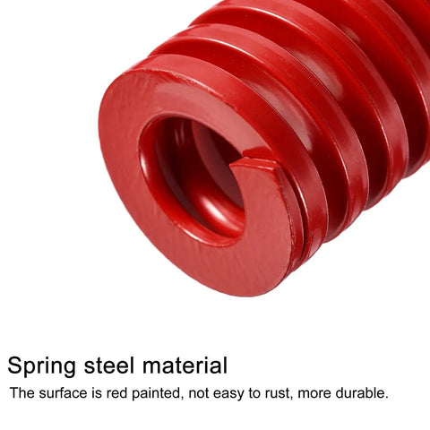 Close-up of red 65Mn steel die spring, showcasing spiral design and rust-resistant red finish for precision fit in die tools and 3D printer assemblies.