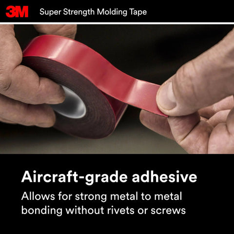 Person holding 3M heavy-duty automotive molding tape 7/8 inch wide by 15 feet, double-sided foam adhesive roll for trim installation.