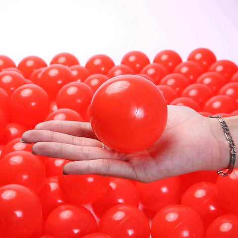 Hand holding 2.75 Inch Big Ball Pit Balls - Crush Proof Plastic Balls for Ball Pit Pack of 50pcs Set for Toddlers