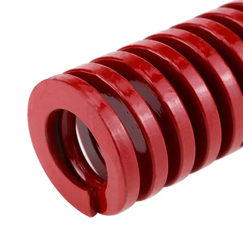 Close-up of a Four Pack Red Mould Die Spring for Dies and Molds, 30mm Outer Diameter, 16mm Inner Diameter, Medium Duty, Spring Steel