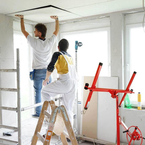 Workers installing ceiling with ✝️ Drywall Lift 11' Drywall Panel Hoist Construction Rolling Caster Tool Jack Lifter in red.