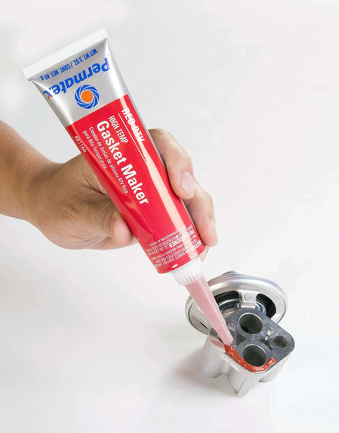Go-To High Temp Red RTV Silicone Gasket Sealant 3 Oz Tube Pack Of 12 Replaces Cut Gaskets And Forms In Place shown being applied
