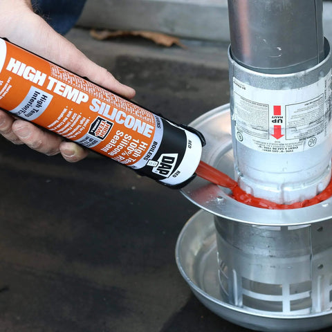 Heavy-Duty High Temp 100 Percent RTV Silicone Sealant Red 10.3 Oz being used on industrial heating element pipe joint