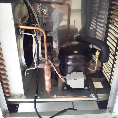 Refrigerator Filter Dryer With Access And Service Valve And Three In One HVAC Tool Kit installation in fridge, copper components visible.