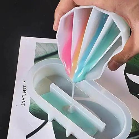 Pouring resin from Resin Art Split Cup Set With Three Compartments Silicone Mixing Cups For Fluid Art And Acrylic Pouring Easy Pour Spout