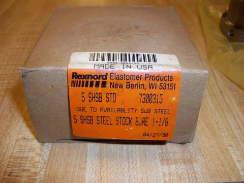 Box labeled Rexnord Elastomer Products with code 7300315, containing Omega Series Coupling Hub Built Tough For One Eighth Inch Bore And Two And Three Quarter Inch Hub Outside Diameter 7300315 Rexnord Reliable Power Transmission Part For Industrial Machinery.