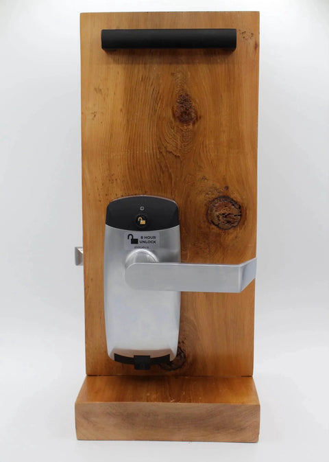 Front view of RFID Commercial Lever Door Lock With App Access Control And Includes 2 NFC Keycards Left Hand on wooden display