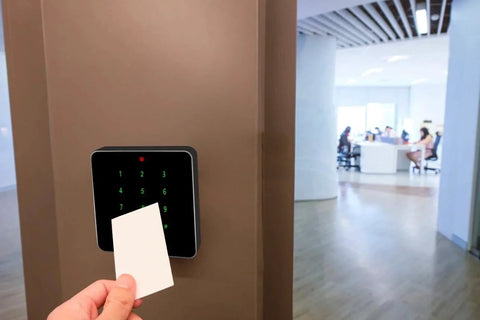 Person using 13.56MHZ RFID Door Access Control With Keypad Waterproof Aluminum Frame Supports 10000 Card Users Includes 5 IC Cards