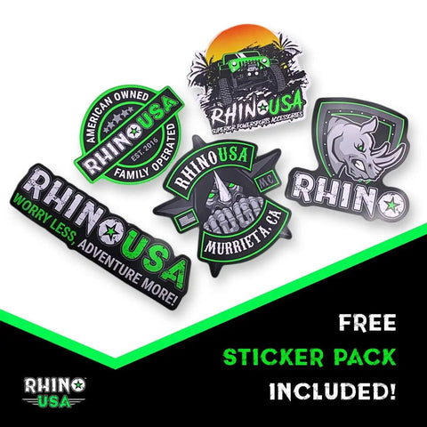 Set of Rhino USA adventure-themed stickers with logos and graphics in various shapes. Includes mountain, rhino, and textual designs.