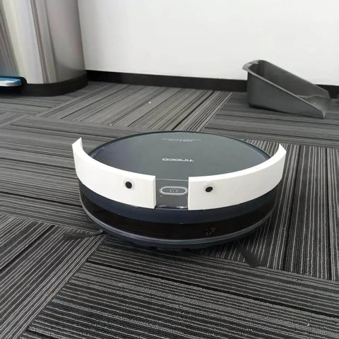 Two Inch Robotic Vacuum Bumper Extender Anti Stuck Guard Keeps Your Cleaner From Getting Stuck Under Couches Beds And Other Low Furniture Fits Most Robot Vacuums Easy Mount Durable Protection For A Hassle Free Clean on a robot vacuum on gray carpet